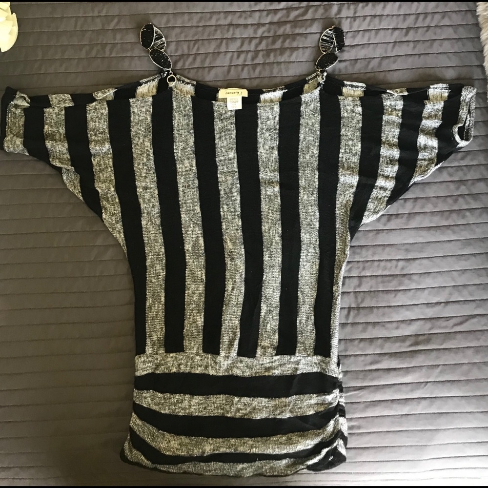 Black and silver top with beaded straps..